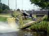 Airboat up river bank